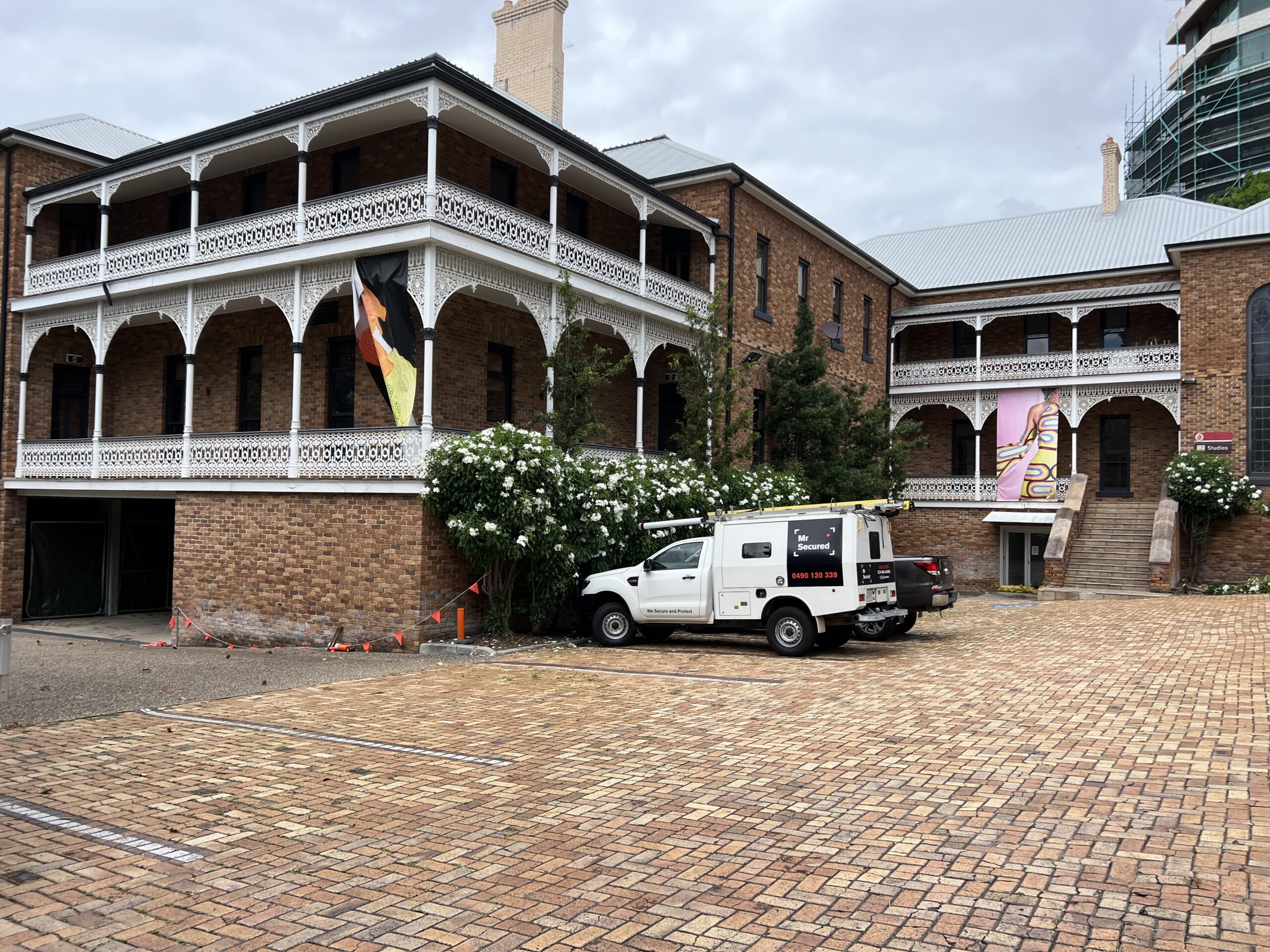 Mr Secured vehicle at a heritage building during a security installation
