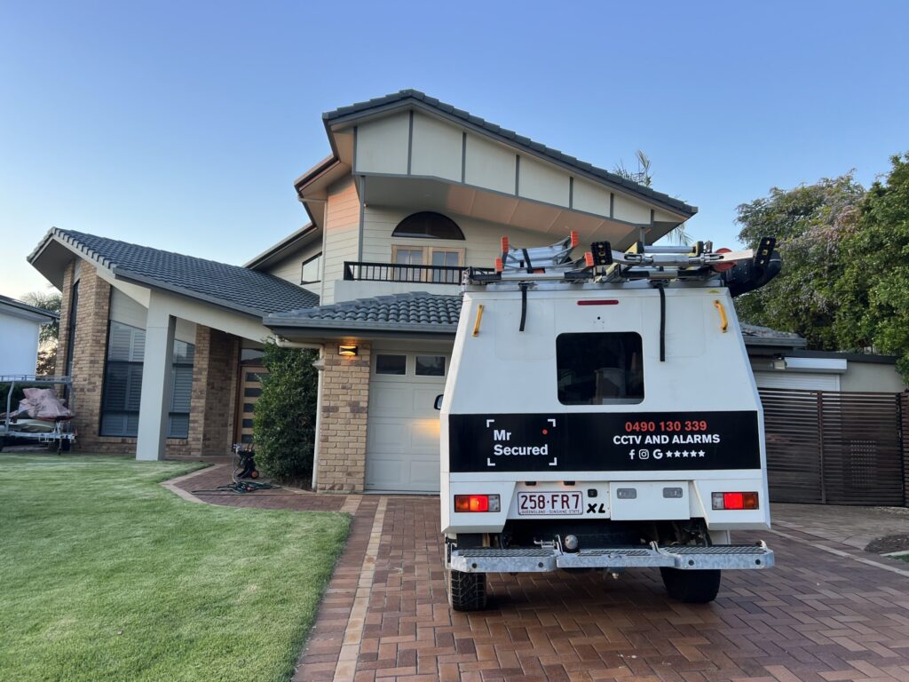 Mr Secured van in the driveway of a solid-brick Brisbane home