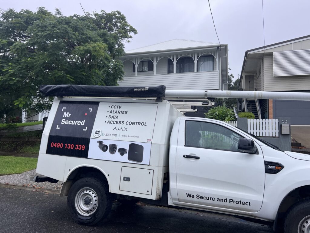 Mr Secured van on site at a Camp Hill double-storey home